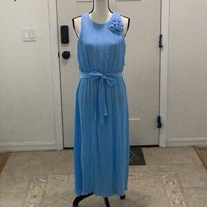 Elegant Blue Sleeveless Dress with Floral Accent